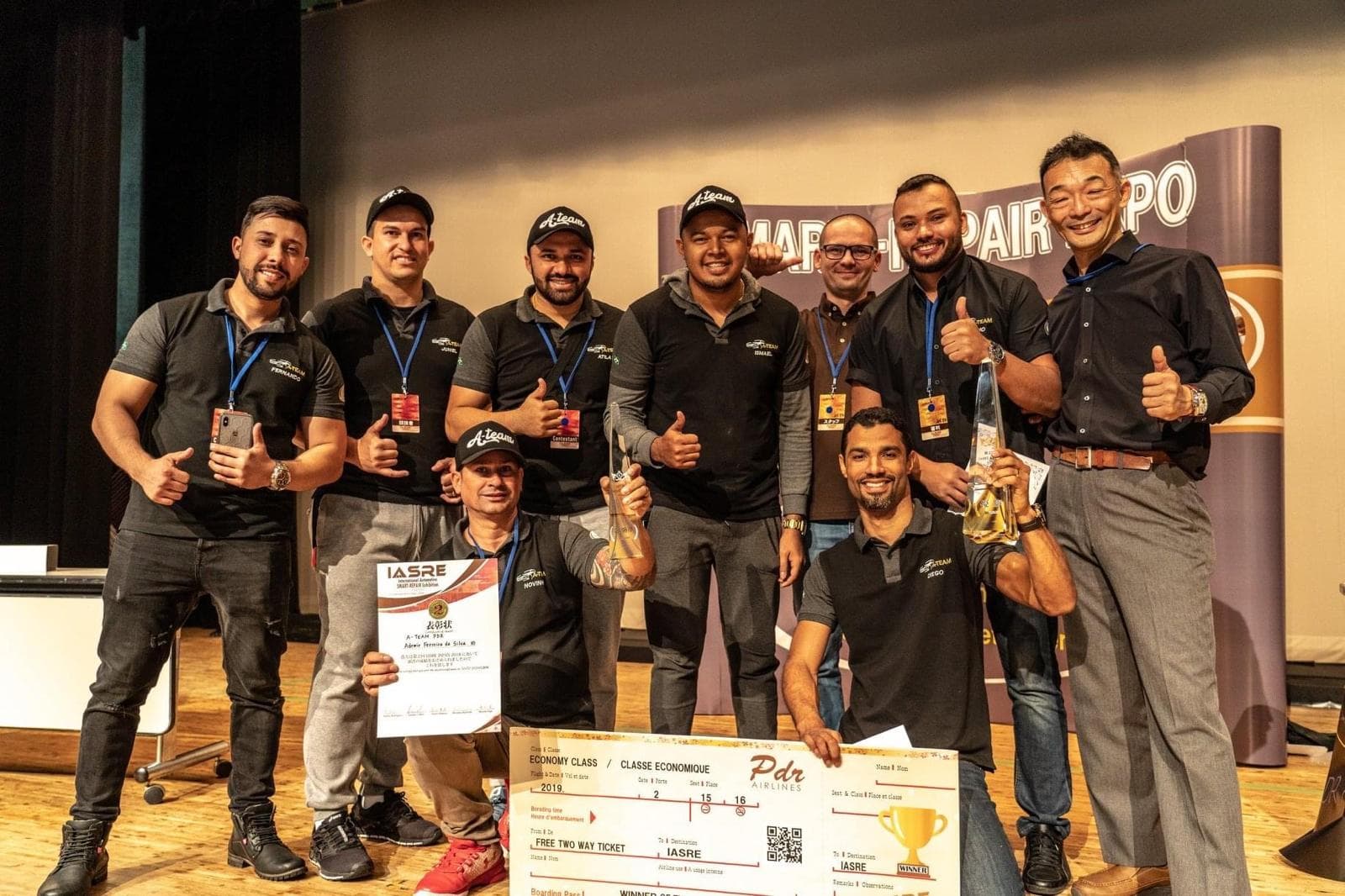 PDR Competition Team picture with trophy and prize